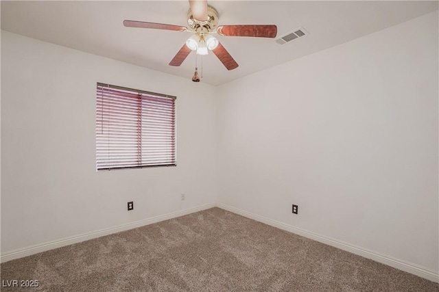 empty room with carpet and ceiling fan