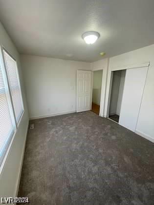 unfurnished bedroom featuring a closet