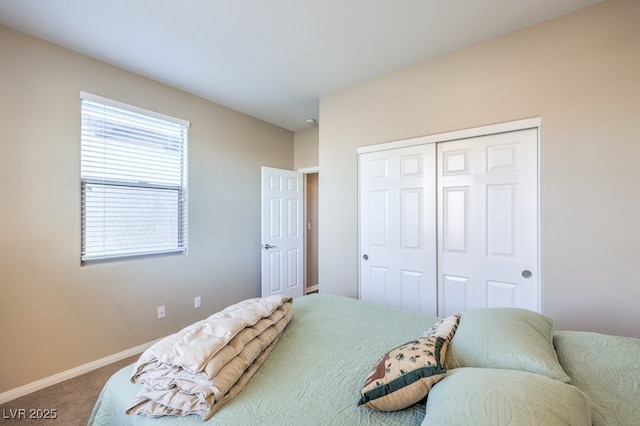 carpeted bedroom with a closet