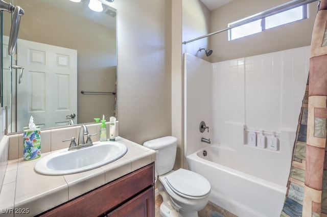 full bathroom featuring toilet, vanity, and shower / tub combo with curtain