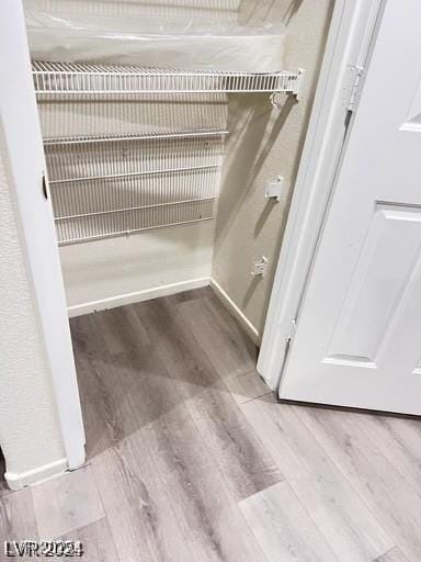 interior details with hardwood / wood-style flooring