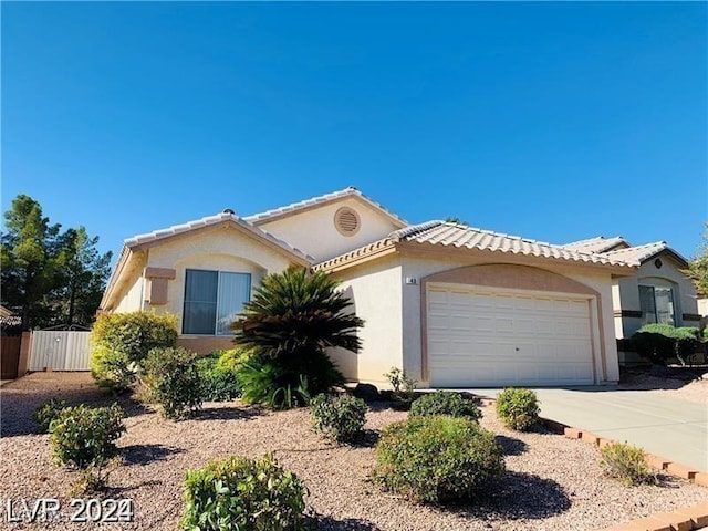 43 Pangloss St, Henderson, NV 89002 - view of front of house with a garage