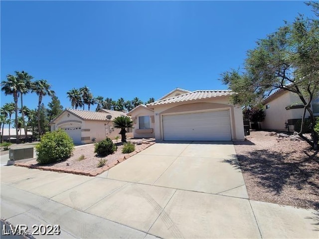 view of front of property featuring a garage