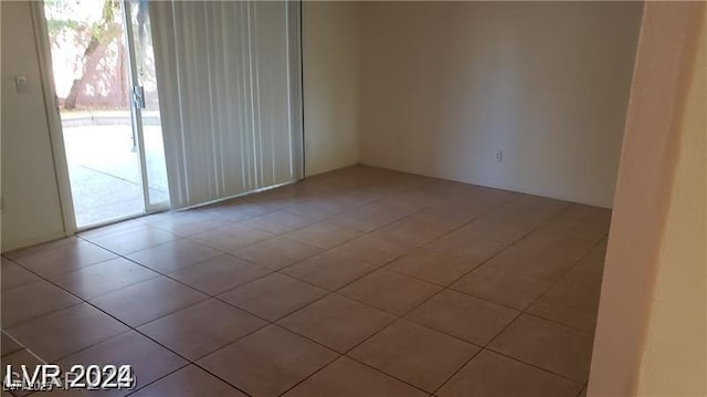 empty room featuring light tile patterned flooring