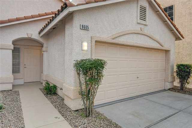 exterior space featuring a garage