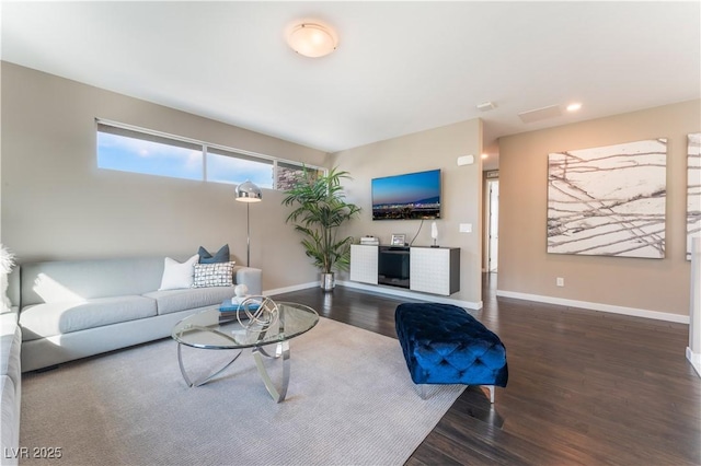 living room with dark hardwood / wood-style flooring