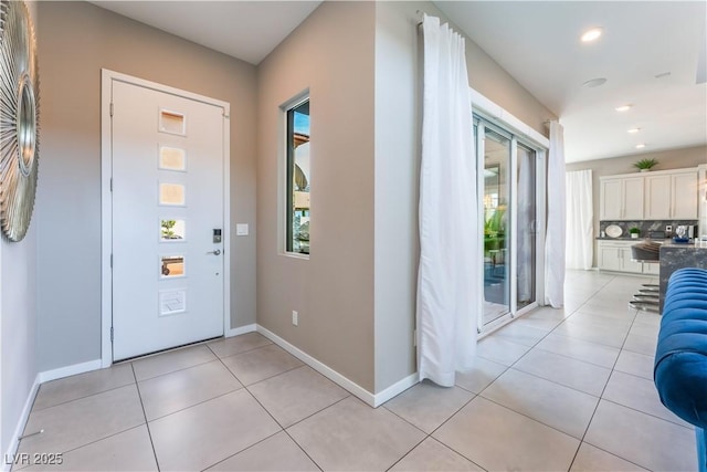 view of tiled foyer entrance