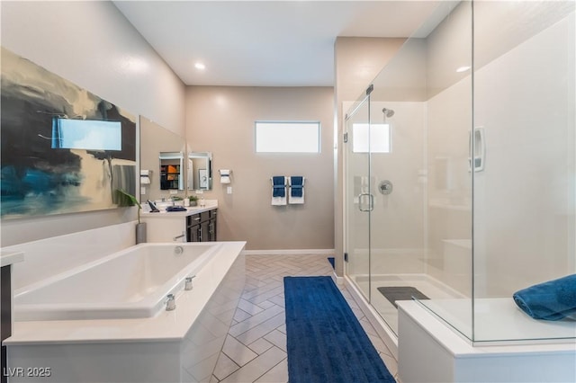 bathroom featuring vanity and plus walk in shower