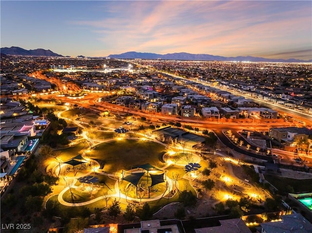 aerial view at dusk with a mountain view