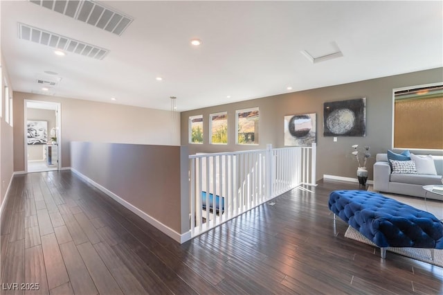 hallway featuring dark wood-type flooring