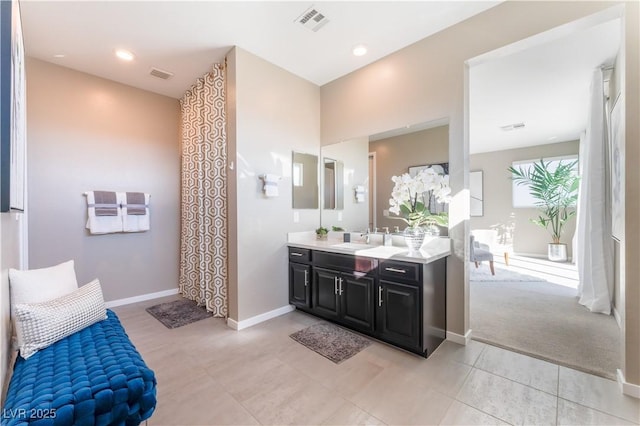 bathroom featuring vanity and tile patterned flooring