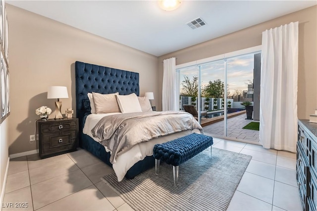 tiled bedroom with access to exterior