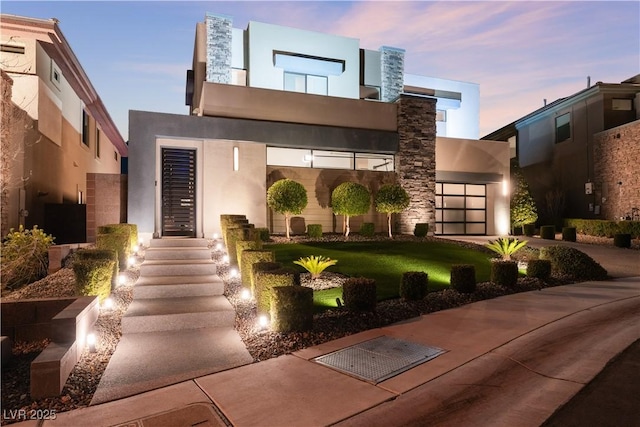 modern home with a lawn