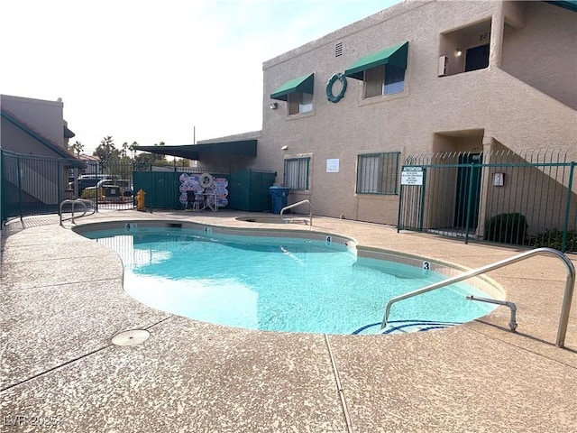 view of pool with a patio area