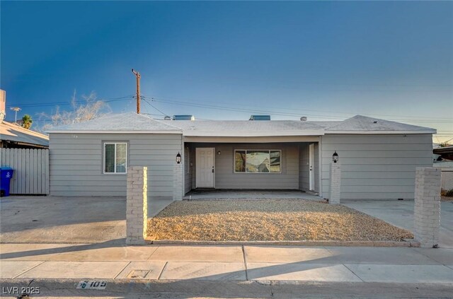 ranch-style house featuring a patio area