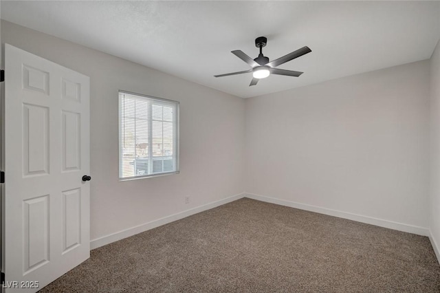 spare room with ceiling fan and carpet floors