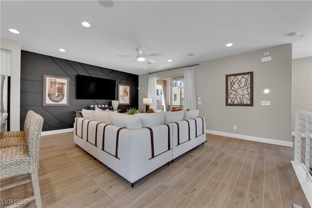 living room featuring ceiling fan