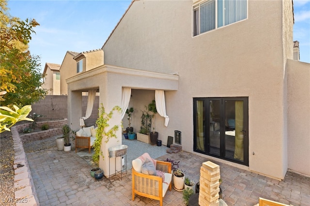 back of house featuring a patio area