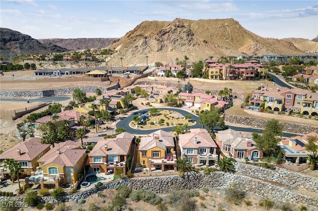 drone / aerial view featuring a mountain view