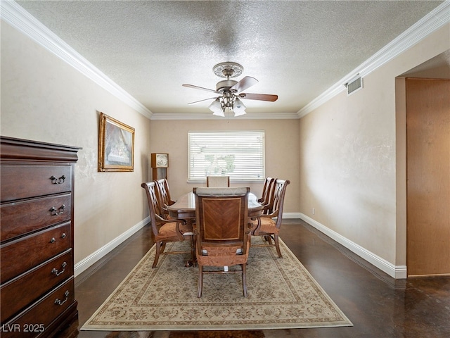 dining area with ceiling fan, a textured ceiling, and ornamental molding