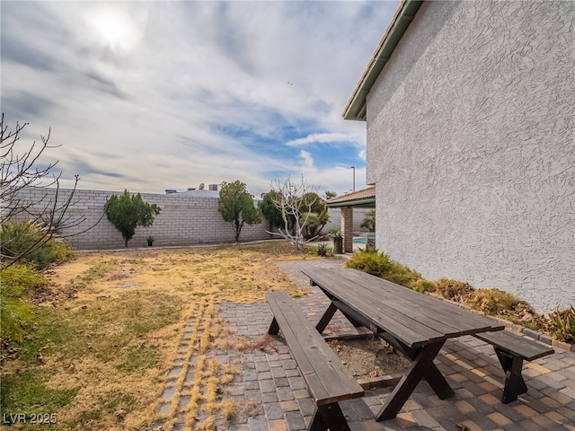 view of yard featuring a patio