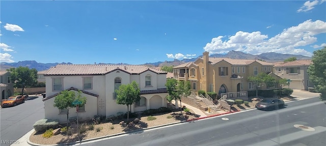 mediterranean / spanish-style home featuring a mountain view