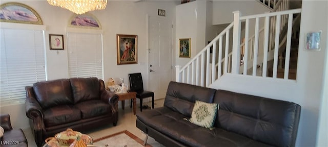 living room featuring a notable chandelier