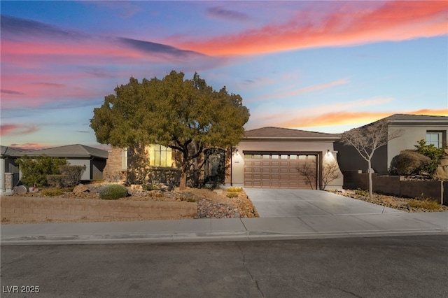 view of front of property with a garage