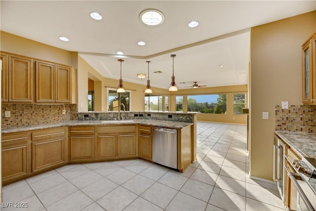 kitchen with backsplash, sink, stainless steel dishwasher, light tile patterned floors, and kitchen peninsula