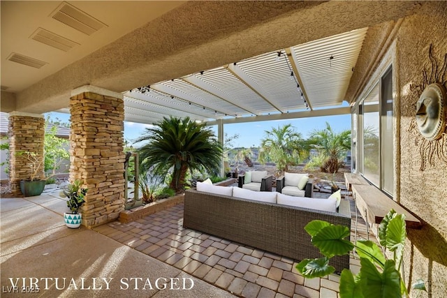 view of patio featuring a pergola and an outdoor hangout area