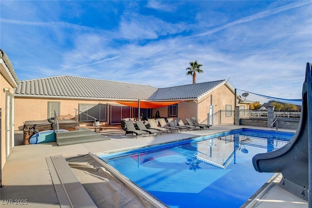 view of pool featuring a patio