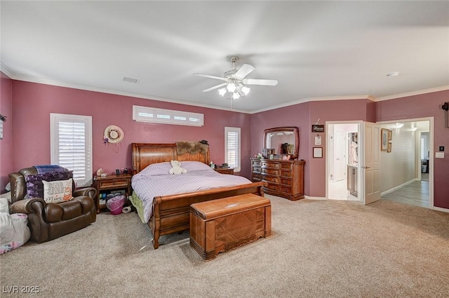 bedroom featuring ceiling fan, carpet floors, and crown molding