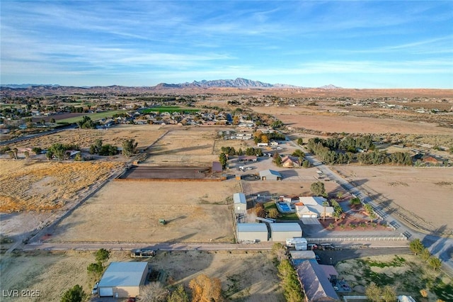 drone / aerial view featuring a mountain view