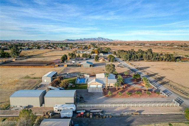 drone / aerial view featuring a mountain view