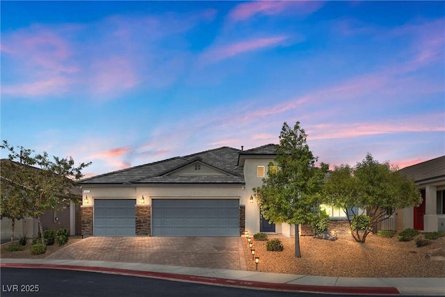 view of front of property with a garage