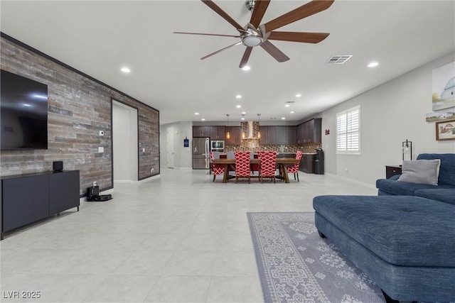 living room featuring ceiling fan