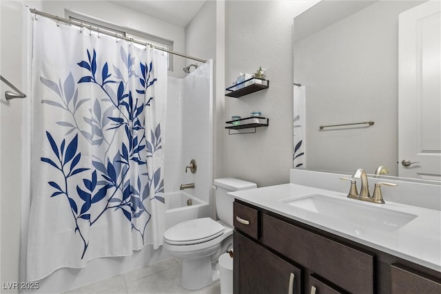 full bathroom featuring tile patterned flooring, vanity, shower / tub combo with curtain, and toilet