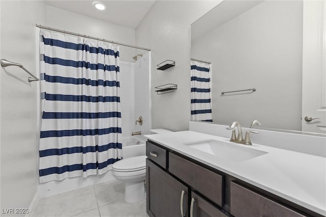 full bathroom with tile patterned floors, vanity, shower / bath combo, and toilet