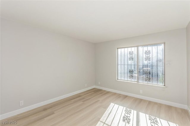 empty room featuring light hardwood / wood-style floors