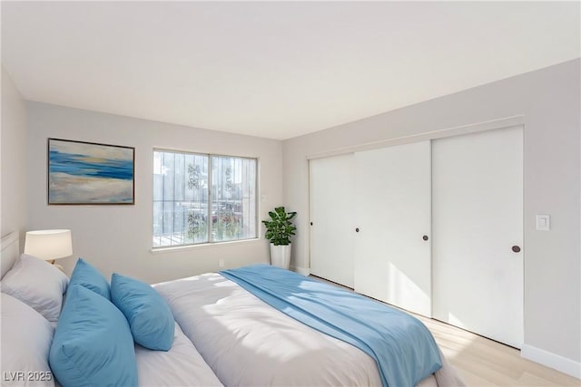 bedroom with light hardwood / wood-style floors