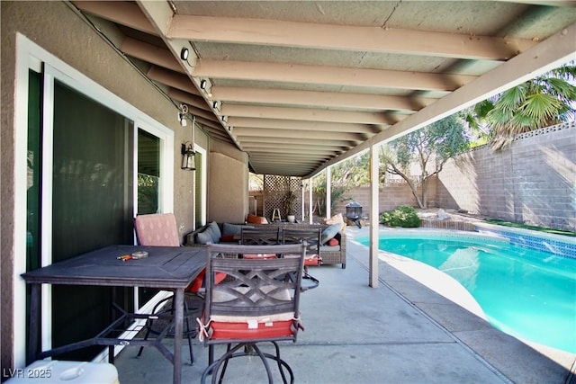 view of pool featuring a patio