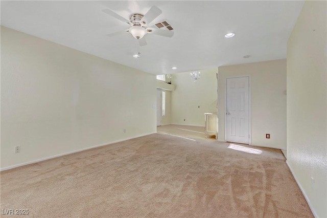 carpeted empty room with ceiling fan