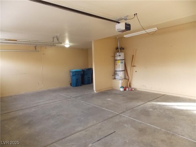 garage with strapped water heater and a garage door opener