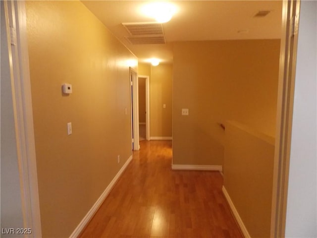 hall featuring hardwood / wood-style flooring