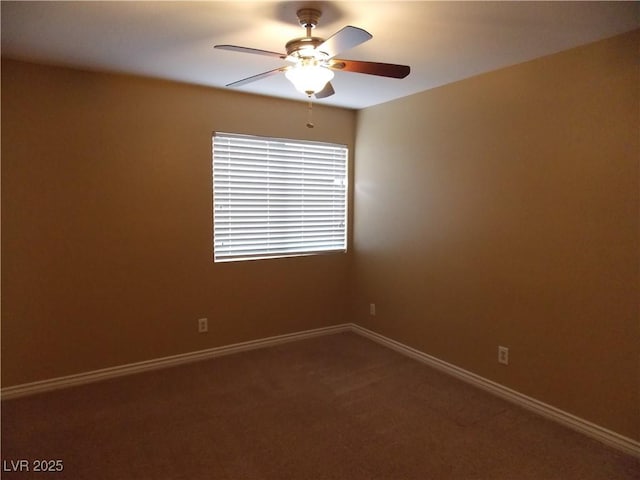 carpeted empty room with ceiling fan