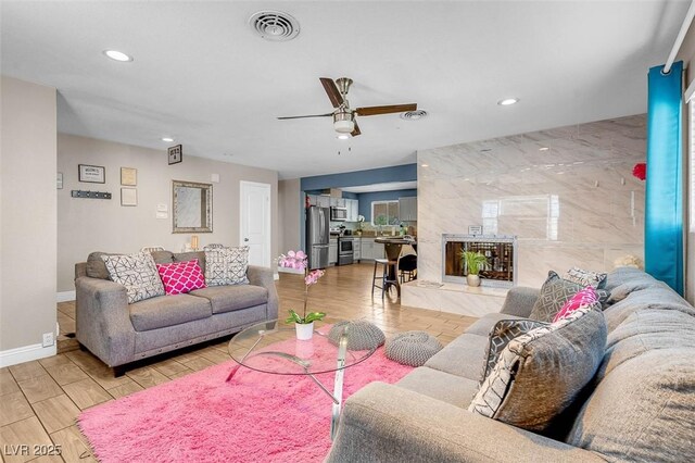 living room with ceiling fan