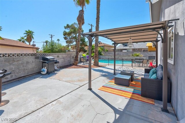 view of patio with a pergola, area for grilling, and a fenced in pool