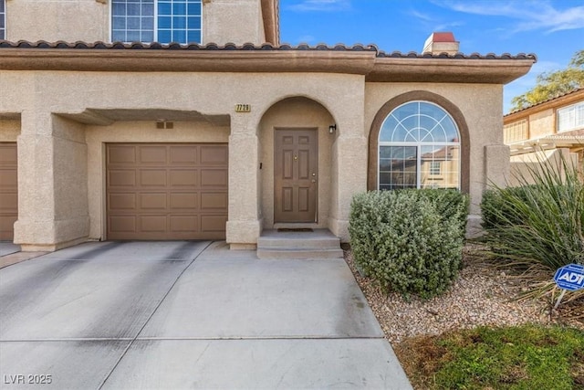 property entrance with a garage