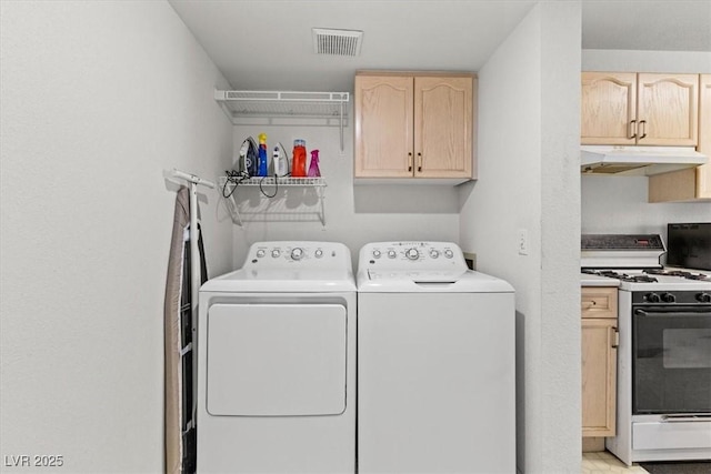 laundry area with washer and clothes dryer