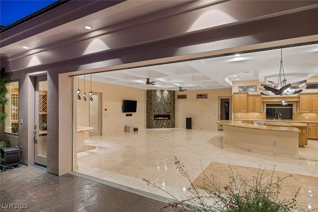 interior space featuring sink and an outdoor kitchen